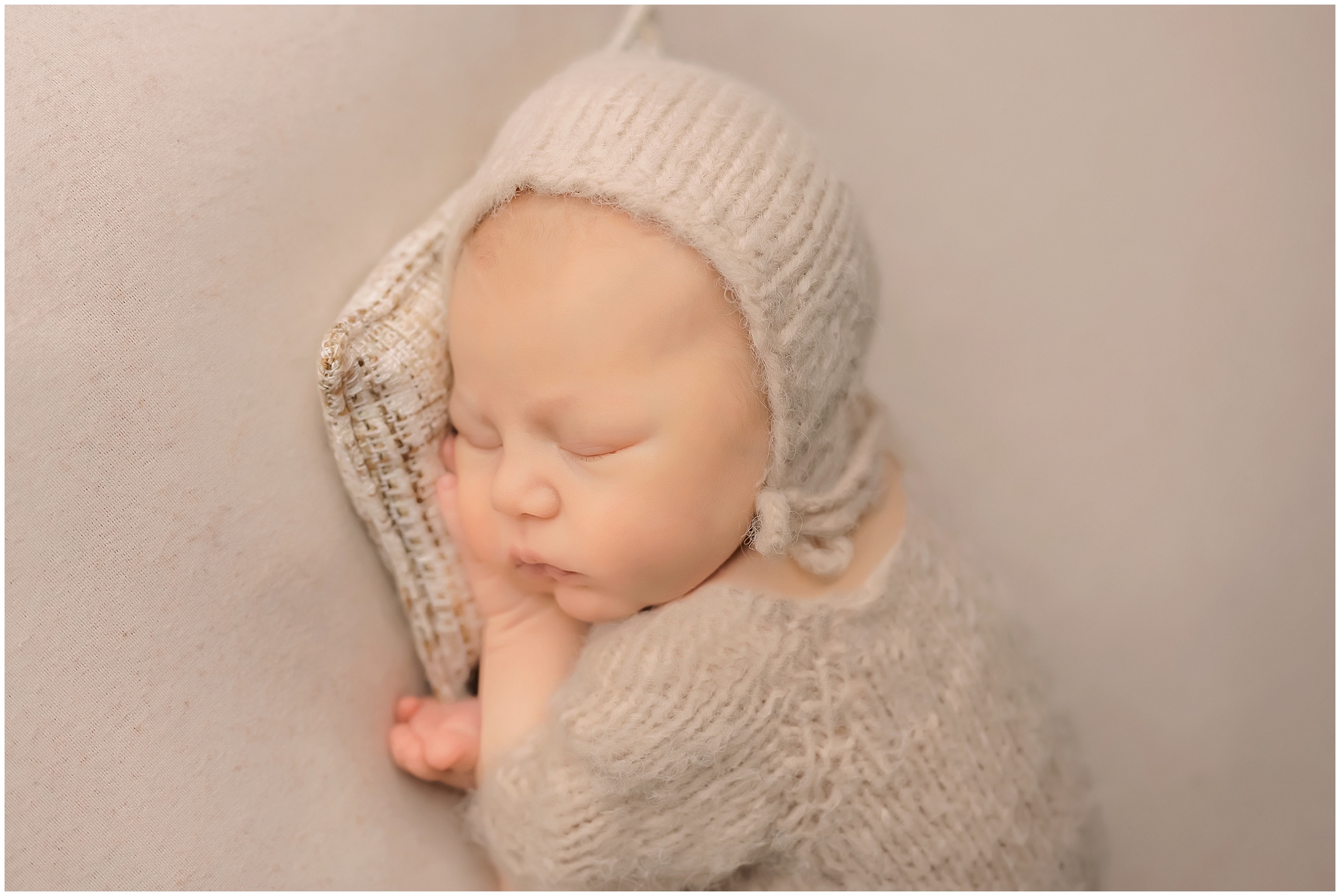 newborn sleeping during photo session 