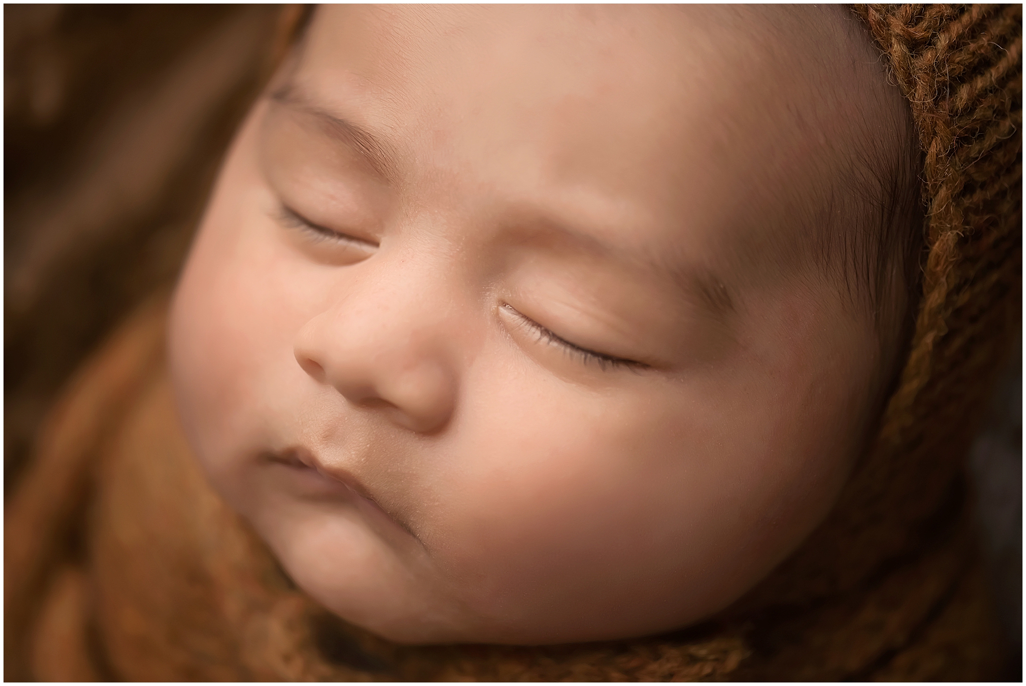 close up of baby face during newborn photography session in london ontario