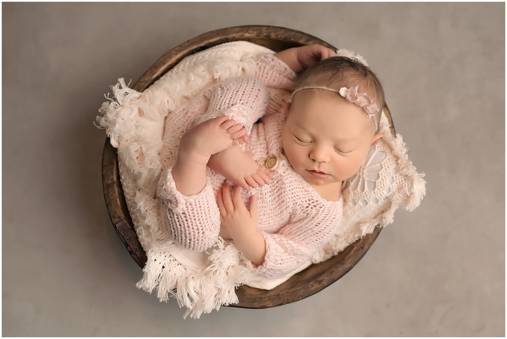 baby sleeping in bowl during newborn photography session in london ontario