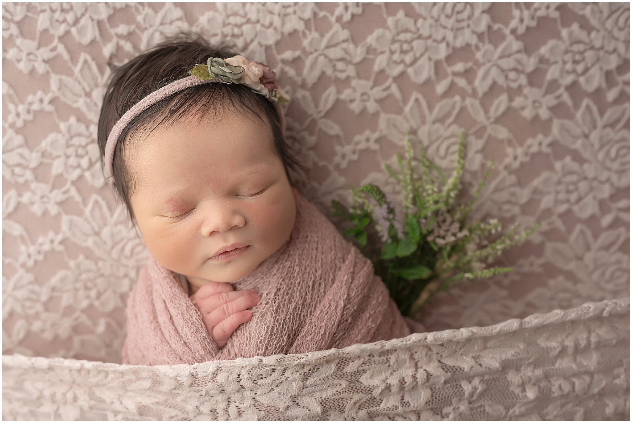 baby sleeping during newborn photography session in london ontario