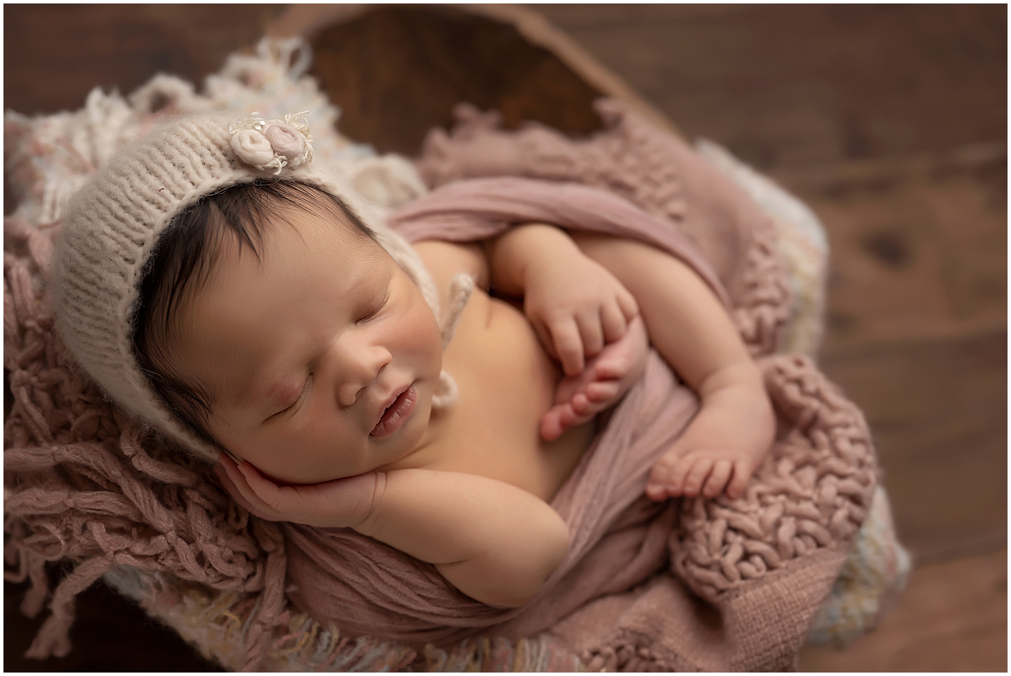 baby sleeping during newborn photography session in london ontario