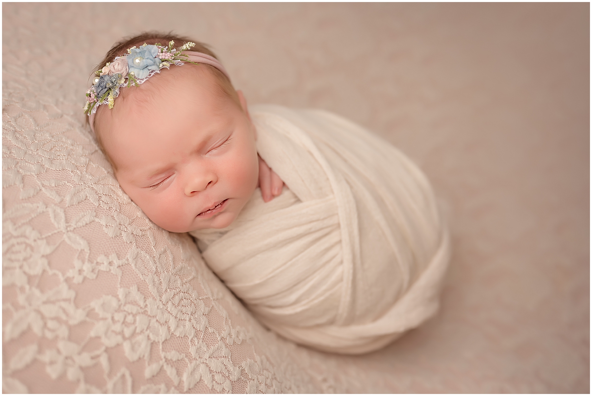 baby sleeping during newborn photography session in london ontario