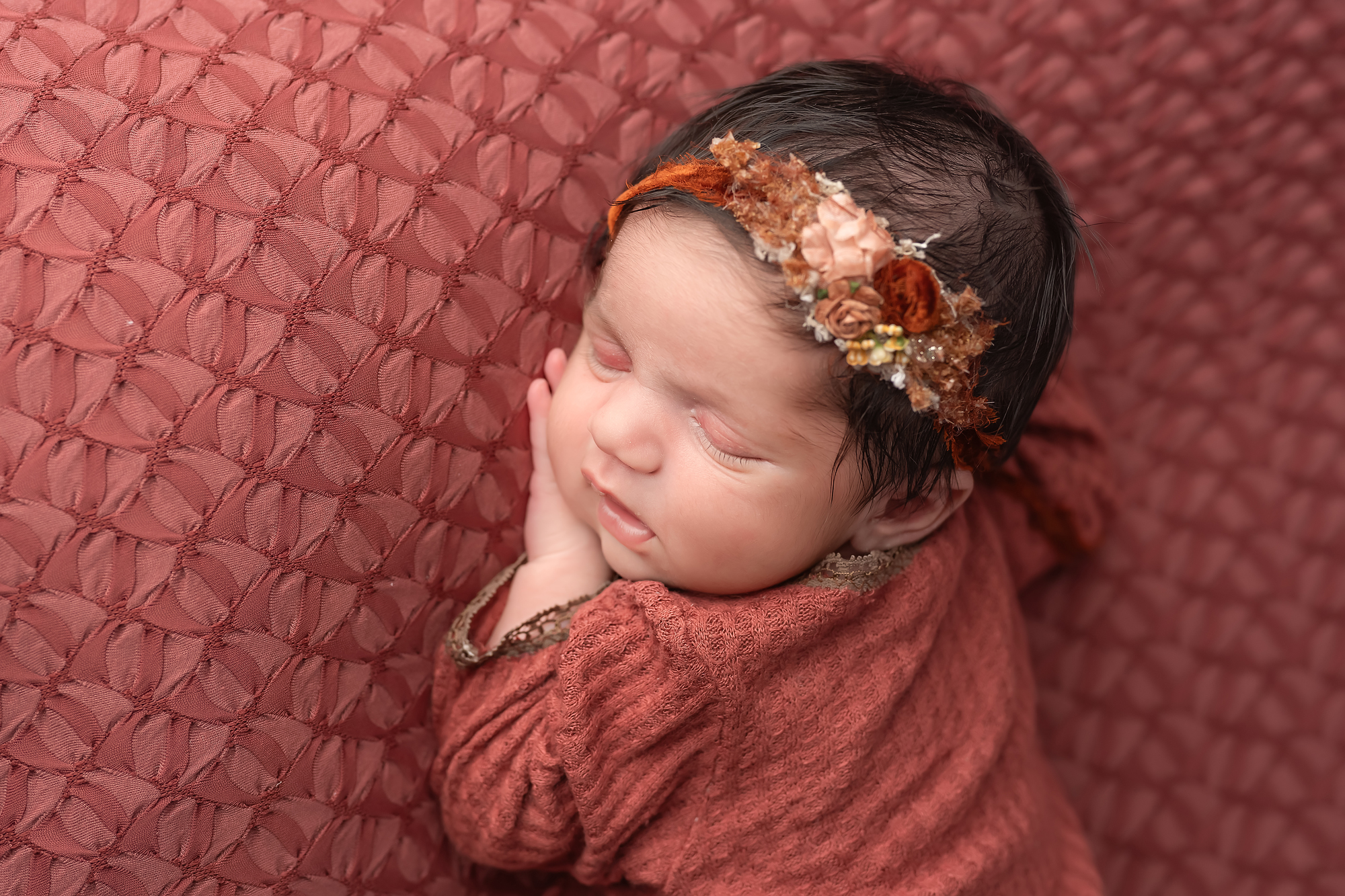 baby girls sleeping during newborn session in studio in london ontario